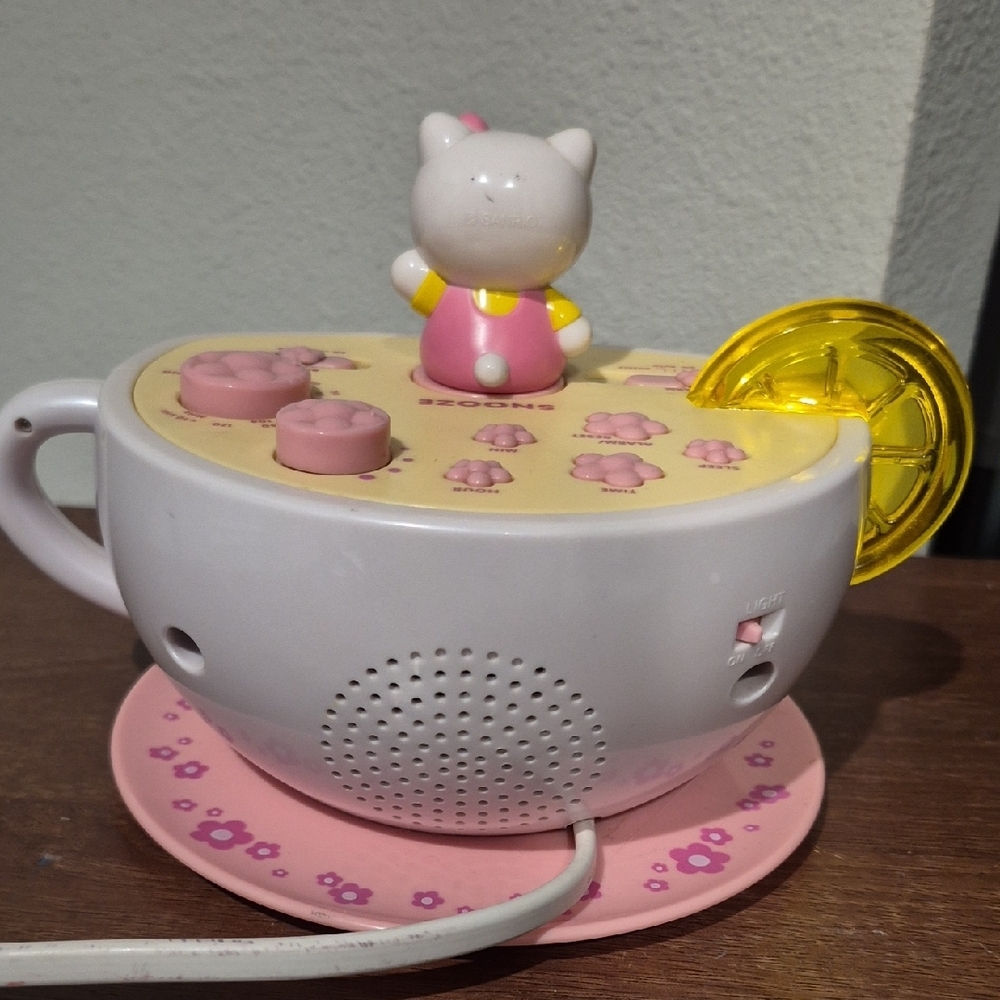 Hello Kitty Pink and White Teacup Clock with Yellow Accent With Night Light - Picture 4 of 4